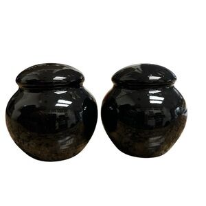 Black round salt and pepper shakers